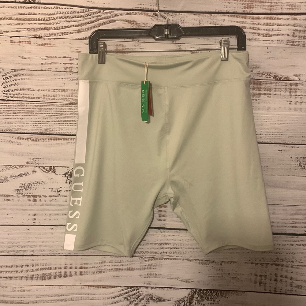 NWT women Guess brand biker shorts size large